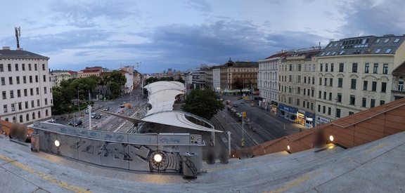 A panorama view over the city from above, taken from the city hall's steps