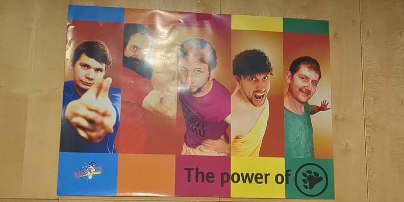 Yet another fictional boyband poster, this time announcing "The power of   (paw icon)"