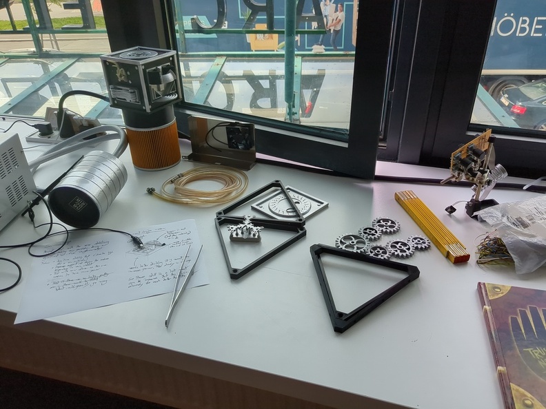 Table with various scientific equipment.
